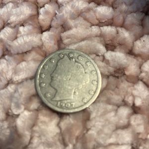 1907 nickle rare, good shape, great for your collection.